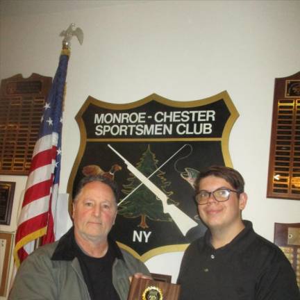Anthony Meluso, Assistant Youth Chair and Assistant Archery Chair, presented the youth Sportsman of the Year award to Kevin Palacino of Florida, NY.