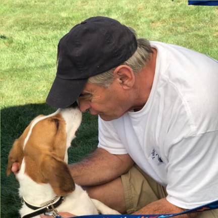 Rick Bossley with his dog, Snoopy, adopted from Goshen Humane Society in 2019. Photo provided.