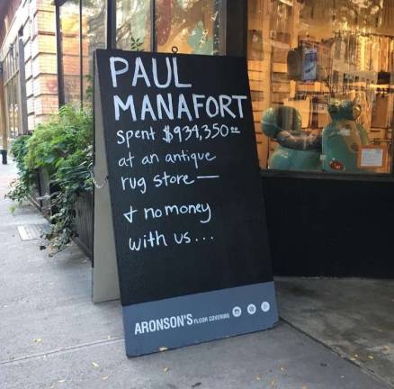 Sign last Thursday outside of Aronson's Floor Covering at 135 West 17th Street. Photo: Ryder Kessler