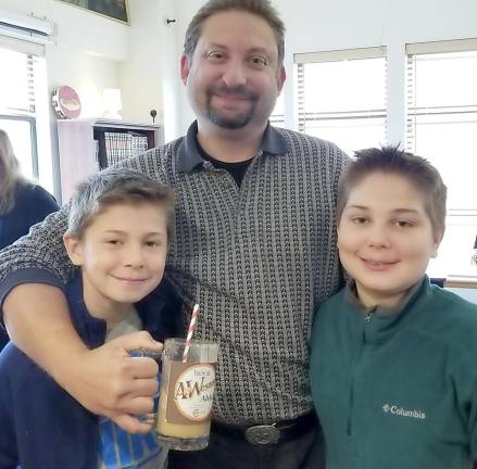 Aiden and Daniel Askenazy of Highland Mills and their dad Lee at A&amp;Wesome Aba Father’s Day event at Chabad Hebrew School.