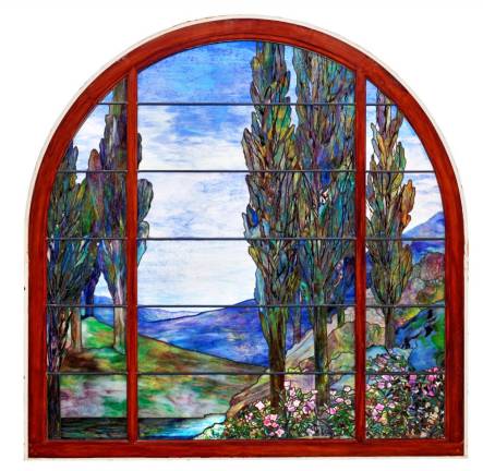 “Cypress and Azalea,” the stained-glass window originally created for the Rushmore mansion, is expected to be auctioned for $300,000 to $500,000 at Christie’s next week.