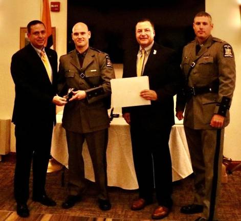 New York State Police Trooper Daniel J. Kokulak with Captain Pete Cirigliano and county officials. Photos provided by Orange County.