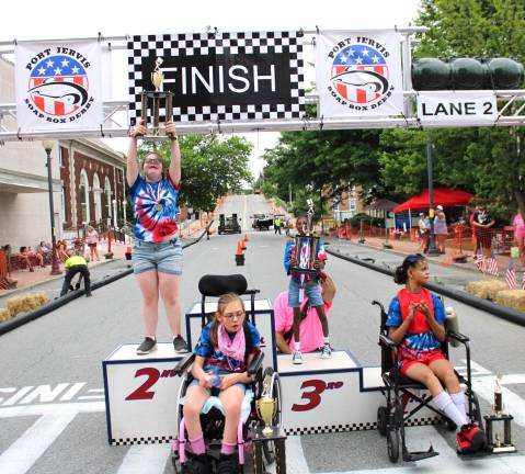 Winners in the super kids division show off their trophies.