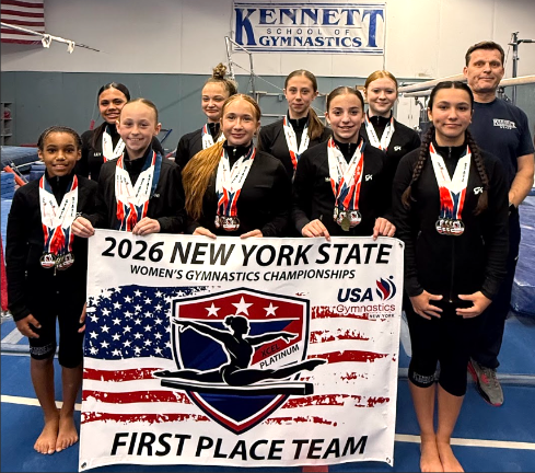 Kennett Xcel Platinum team. Front (L to R) – Ashley Abreu, Emerson Parrington, Elizabeth Zhepak, Harper Hinspeter and Sara Marina. Back (L to R) – Lily Marvulli, Adelyn Sarno, Jenna Fonda, Rilee Davies and Coach John Smales.