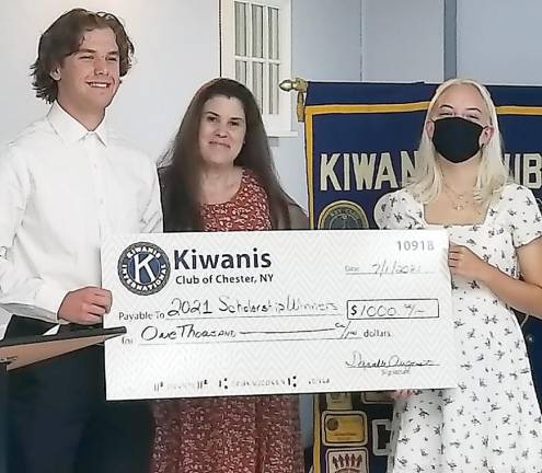 Pictured from left to right are: George Slicker, Chester Kiwanis Club President Danielle August and Angelina Zaporojtsev.