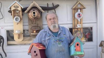 Micheal Kaleita uses repurposed wood to build birdhouses. “It’s happy stuff in a miserable time,” he saidd. “You’ve gotta be an Ebenezer Scrooge not to like birds.” Photo by Jacob L. Mott.
