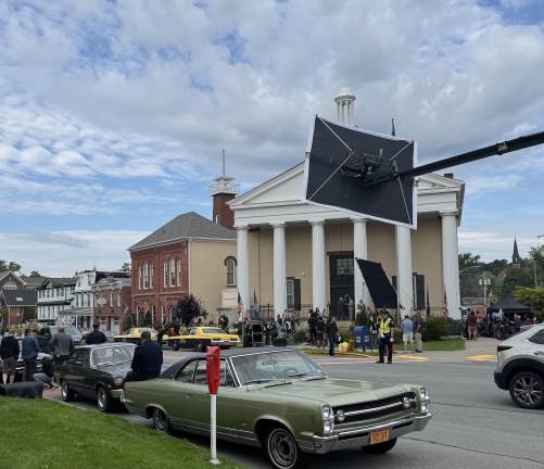 Film crews outside the 1870 Courthouse on Main Street in Goshen.