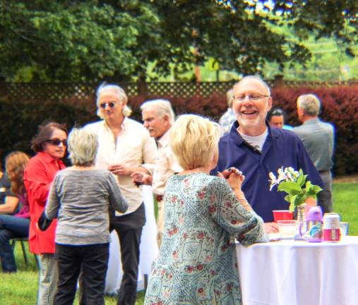 Attendees enjoying “Taste of Goshen,” a fundraiser for the Goshen Rotary Club
