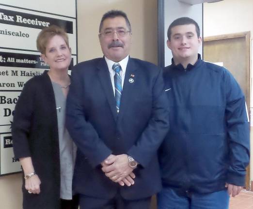 Anthony LaSpina, highway superintendent (center) with wife, Mary, and son, Philip