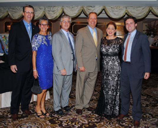 At the event, from left, are Honorable Leigh J. Benton and Victoria Benton, Orange County Legislator; Chris Eachus, Orange County Legislator; David M. Hoovler, District Attorney; Kellyann Kostyal-Larrier, Safe Homes Executive Director; James Skoufis, Assemblyman.