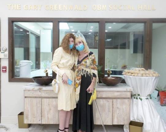 Joanne Greenwald, daughter of Diane and Gary Greenwald, with her mother. The social hall is dedicated in memory of Diane's late husband, the attorney Gary Greenwald.
