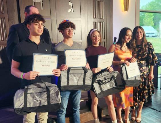 CTeen 5 Friendship Circle volunteers receive awards and recognition for their work with children and teens with special needs, at Chabad’s Teen Gala Award Ceremony.