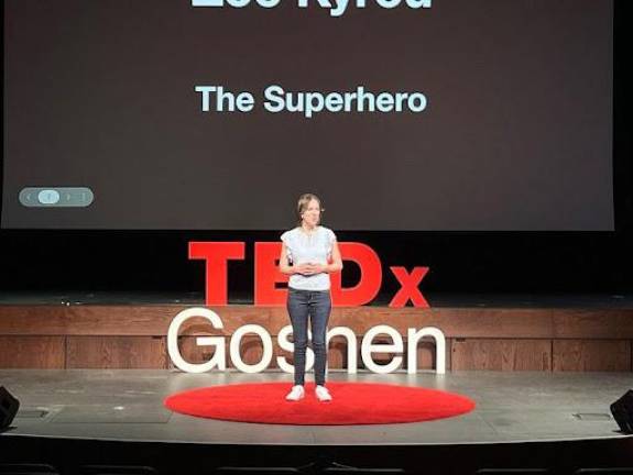 Zoë Kryou teaches the audience how to become a superhero by “conquering the villain within.”