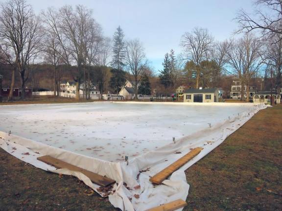 The tarp-covered skating rink in Ann Street Park, Milford, Pa., before the Winter Lights Festival