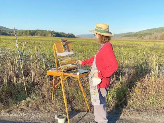 Plein air painter at a scenic Hudson Valley location