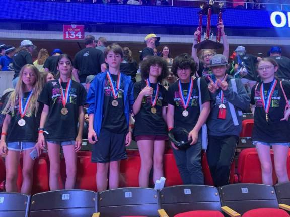 Seven C.J. Hooker Middle School students were crowned Odyssey of the Mind World Champions at the Iowa finals last weekend.
