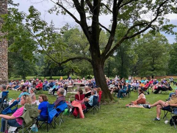 This is a portion of the crowd of 250 people on the side lawn of the Goshen Public Library and Historical Society last Saturday who came for the music and ice cream. Photos provided by Jim Tarvin.