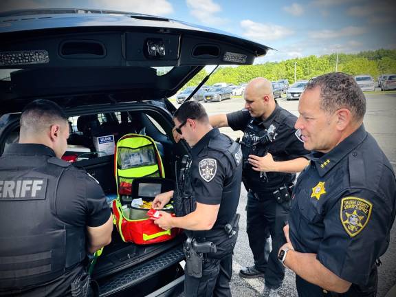 Fly-Car members completing the daily Part 800 equipment check.