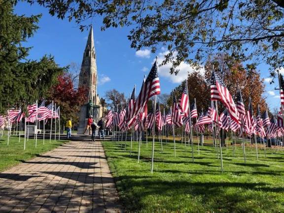 Flags for Heroes display at Church Park in Goshen.