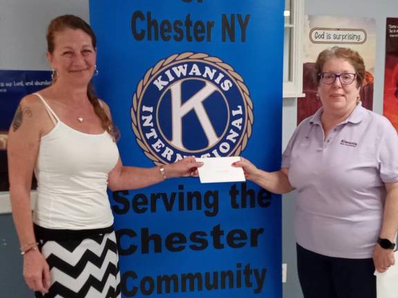 Chester Kiwanis President Sue Bahren and Nick Anello’s mother, receiving his award.