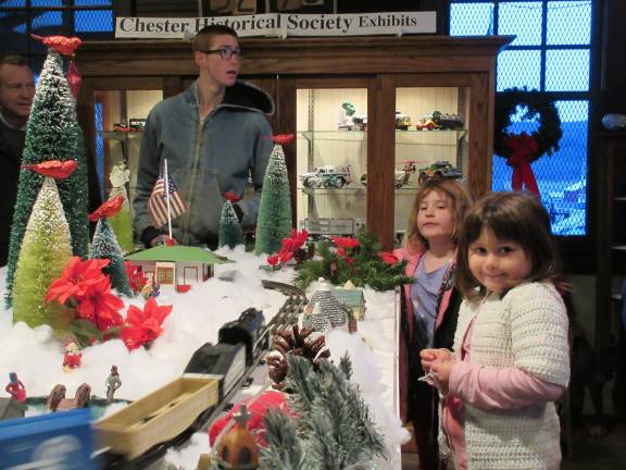 Kayla Smith and Julianna Small with model train (Photo by Ginny Privitar)