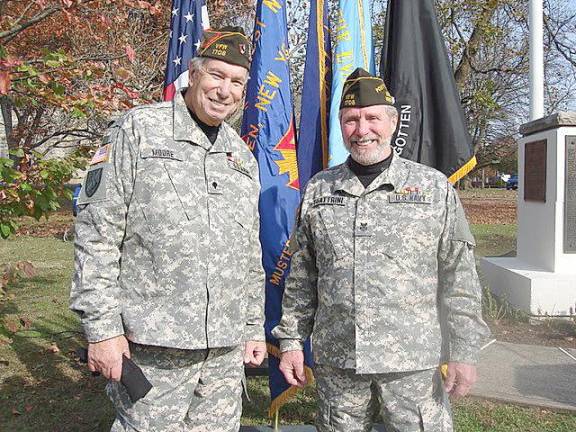 Vietnam veteran Bill Moore (left) with Commander Ray Quattrini on Veterans Day in Goshen.