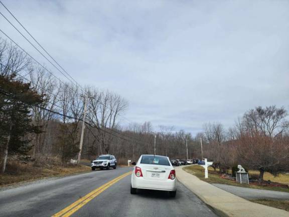 Parents’ cars line up on Hambletonian Avenue, the road leading to Chester Academy, to pick up students from school. Photo: Samantha Finch