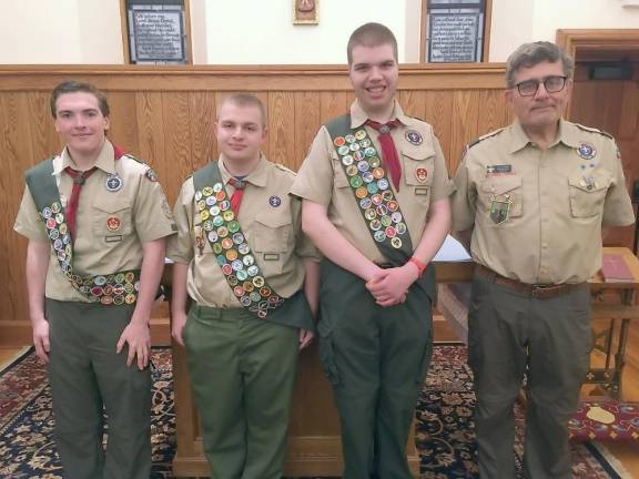 Eagle Scouts Daniel Hartley, Alexander Canale, Samuel Lieneck, and Troop 4063 Scout Master Jeffrey Albanese (left to right