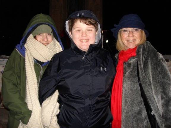 The Greenwald family &#x2014; Joanna, Landry and Diane &#x2014; enjoyed the brisk evening in Church Park celebrating Hanukkah (Photo by Geri Corey)