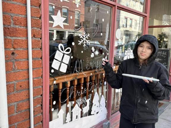 Chester Academy students decorate local shops with holiday scenes