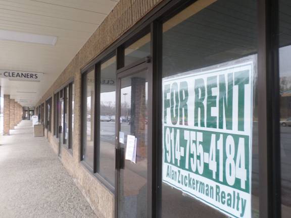 Almost half of the storefronts at the Goshen Center Plaza are vacant. (Photo by Nathan Mayberg)