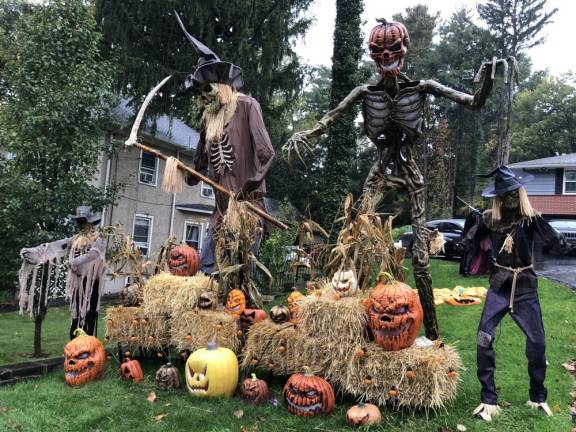 A house on Main Street near Clarkson Street in Newton, N.J., features a number of Halloween decorations on its lawn. (Photo by Kathy Shwiff)