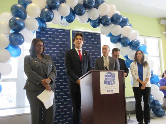 City Council Member Ben Kallos speaks at the Stanley M. Isaacs Neighborhood Center, with Public Advocate Letitia James (left). Photo: Office of Ben Kallos