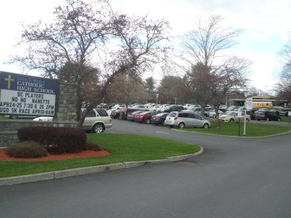 The parking lot of John S. Burke Catholic High School this week during dismissal.