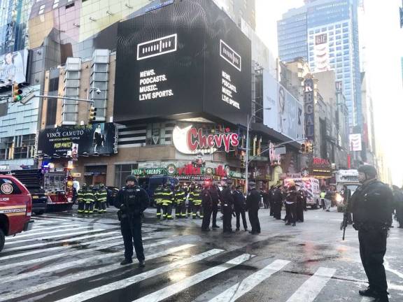 Police, fire and other emergency personnel converged on Times Square this morning following the pipe bomb explosion in the passageway connecting the Times Square and Port Authority. Photo: NYPD