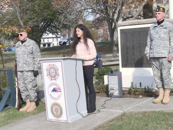 Lauren Luck, of Goshen, a seventh-grade student at Tuxedo Park School, sang the national anthem for an attentive crowd at the Veteran's Day ceremonies in Goshen. She also sang America the Beautiful later in the program.