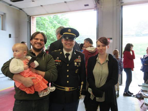 Daughter Dinah, dad Bill, and uncle Sgt. First Class US Army John Hand, and Bill&#x2019;s wife, Rebecca (Photo by Ginny Privitar)