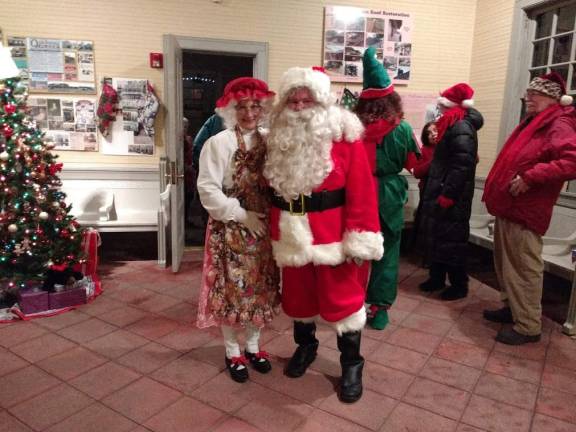 Santa and Mrs. Claus inside the Erie Station (Photo by Ginny Privitar)