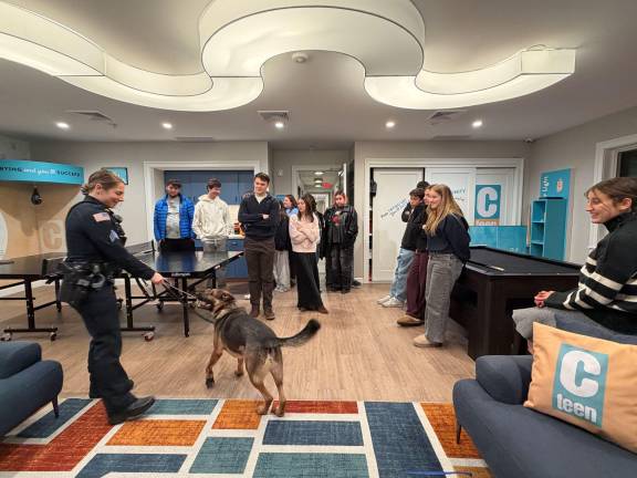 The group learns about police dog handling.