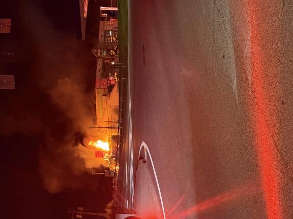 Fire damages the Chestnut Market on Brookside Avenue in Chester early Tuesday morning.