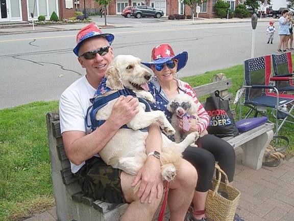 Poised to watch Goshen’s Memorial Day Parade are Tom Gordon, holding five-year-old Abby, and Lillian Lees, holding Hamilton, 14 1/2 years old. The couple lives in Chester and noted that both dogs are rescue dogs.