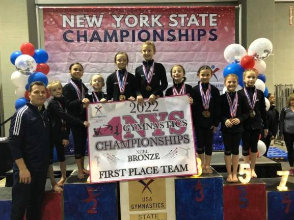 Kennett School of Gymnastics Xcel Bronze team, a division for ages 6 - 8, took first place at the New York State Championship in Syracuse on April 3. Photo provided.