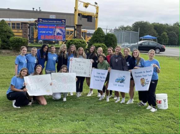 The Goshen High School girls and boys soccer club raised close to $1,500 for the Goshen Ecumenical Food Pantry. Photo courtesy Susan Armistead.