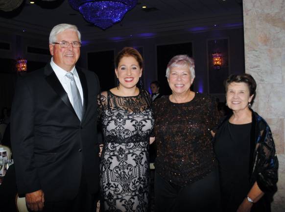 Pictured here, from left, are Dave Goggins, Safe Homes founder; Kellyann Kostyal-Larrier, Safe Homes executive director; Lisa Daily, Safe Homes founder and Jacqueline Murray, Safe Homes founder.