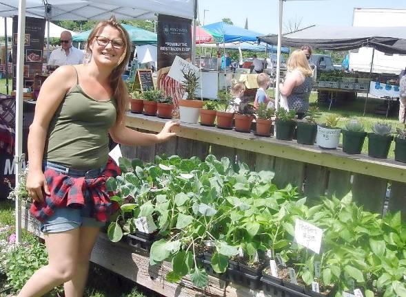 Vendor Sarah Jane Gailie with Twin Ponds Greenhouse offered home gardening veggies, like tomato, lettuce and pepper plants. Photos by Geri Corey.