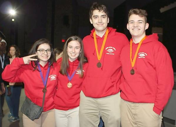 Stephanie Gyrla, Eve Doyle, Ryan Hludzinksi and Ben Pahucki are very excited to show off their medals for the Astronomy event