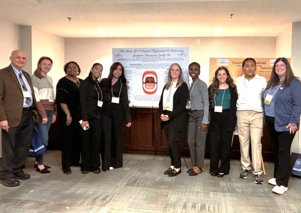 SUNY Orange students Molly Lewis (third from right) and Angel Mejia (second from right) captured first place for a research presentation on evidence-based alternatives to fluoride use at the recent New York Dental Hygienists’ Association Empire Conference.