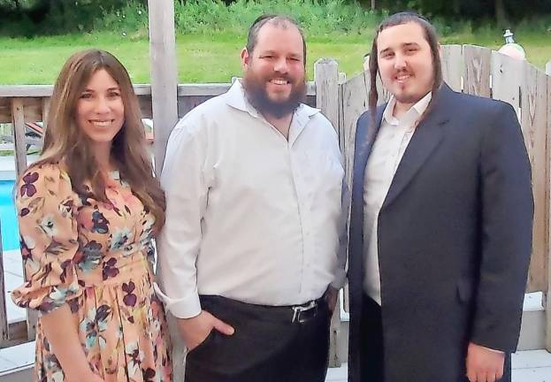 Rabbi Pesach and Chana Burston hosted a community Summer Social BBQ in their backyard with Hasidic influencer Shloime Zionce. Photos provided by Chabad of Orange County.
