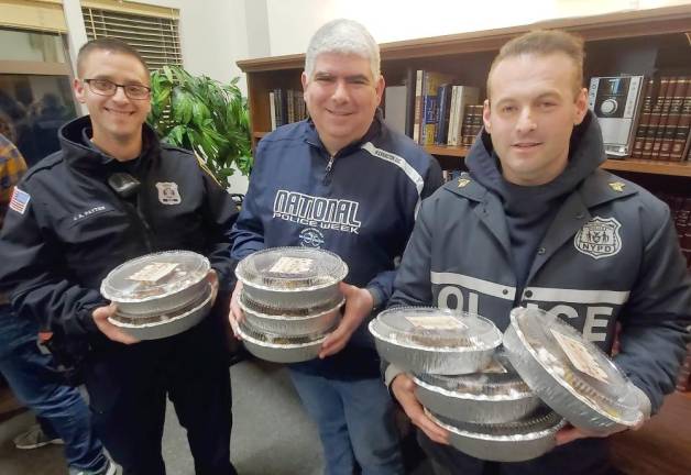 Officer Payton, of the Village of Monroe Police Department, Sergeant Cohn, of Warwick, and NYPD Sergeant Shevitz, of Monroe, were gifted with chocolates made by teens at CTeen’s “Chocolates for Cops” at the Chabad Center in Chester.