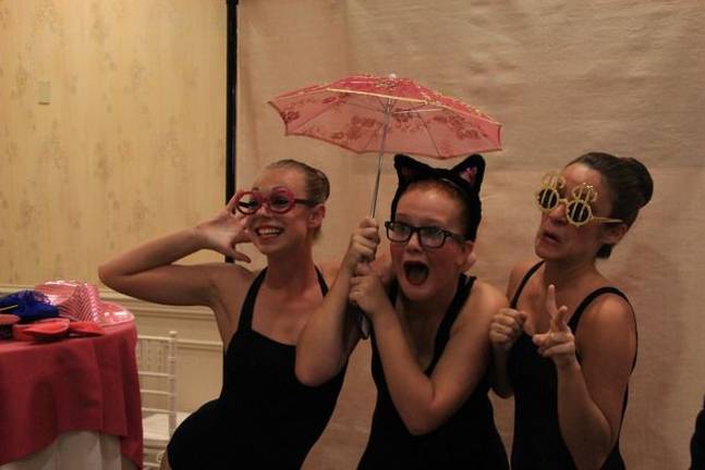 Lauren Morris of Sparta, maria Iacopelli of Branchville, Morgan Parker of Vernon dress up for the photo booth.